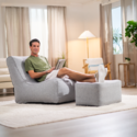 Fauteuil gris avec pouf